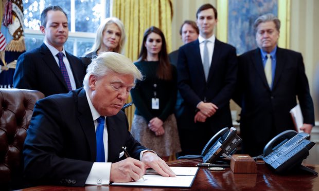 Donald Trump signs executive orders to allow Dakota Access and Keystone XL pipelines to go ahead. Photograph: Shawn Thew/EPA