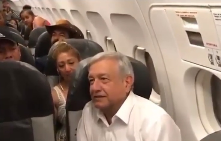 AMLO stuck for hours on commercial flight (Photo: Reuetrs)